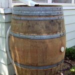 Master Garden Products - Rain Barrel 27"x35" - For water conservation in your community, we recommend you use our rain barrels to help conserve our natural resources. Our 52 to 60 gallon rain barrels are made of recycled water tight wine barrels that can also be used as a plant stand when rain is not expected by simply closing the top of the barrel. Our vineyard oak wood rain barrel  enables the user to gather and draw upon their own renewable water resources and conserve our natural water supply. At the rain collection area, a screened opening minimizes insect entry into the barrel while filtering debris from incoming water. You don't need to switch a diverter during a downpour with our rain barrel. An overflow socket, located at the top/back of the barrel, designates the direction of excess water to flow. A hose can be attached, to divert overflow to a garden or distant runoff area. All colors shown on the pictures may vary because these are made from used wine barrels, each one is different as we get them.