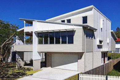Inspiration for a contemporary white exterior in Brisbane.