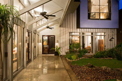 Mid-sized trendy purple two-story metal house exterior photo in Houston