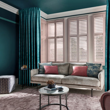 Pink Shutters in Deep Teal Living Room