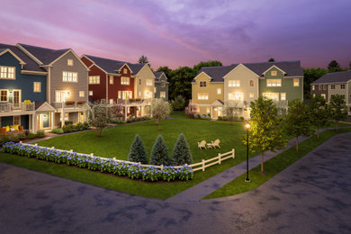 Inspiration for a transitional three-story vinyl exterior home remodel in Boston with a shingle roof and a gray roof
