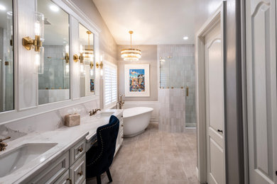 Bathroom - mid-sized french country master gray tile and subway tile porcelain tile, gray floor, double-sink and wall paneling bathroom idea in Phoenix with flat-panel cabinets, white cabinets, a bidet, gray walls, an undermount sink, quartz countertops, a hinged shower door, white countertops and a built-in vanity