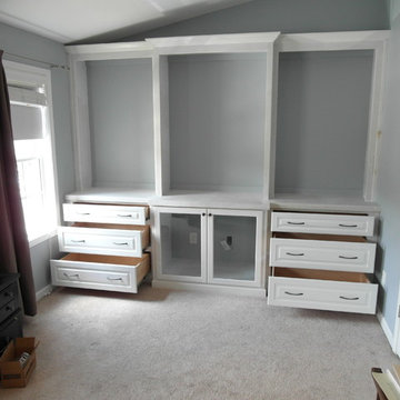 Staggered Wall Cabinets with Glass Doors