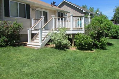 Deck - mid-sized traditional backyard deck idea in Minneapolis with no cover