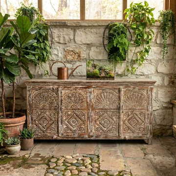 Eclectic Bohemian Style with Vintage Carved Sideboards and Antique Door Tables