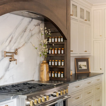 Painted Inset Cabinetry and Leathered Granite in a Transitional Edmond Kitchen