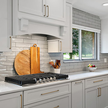 Starmark Bridgeport Kitchen & Primary Bath in White & Blueberry