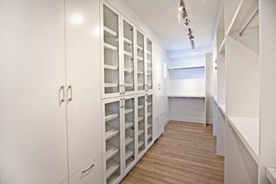 Example of a trendy closet design in Calgary