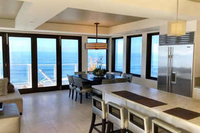Example of a beach style dining room design in San Diego