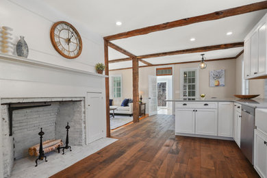 Example of a farmhouse home design design in Other