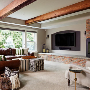 Design ideas for a medium sized urban walk-out basement in Minneapolis with grey walls, a corner fireplace and a brick fireplace surround.