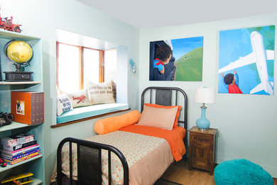 Design ideas for a contemporary kids' bedroom for kids 4-10 years old in New York.