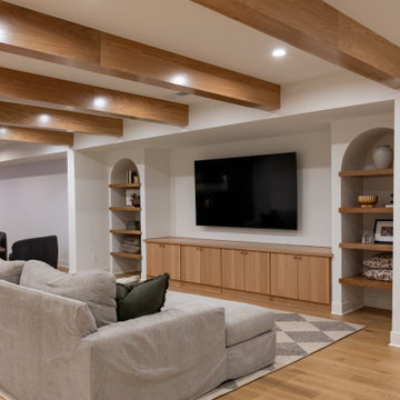 Modern Cozy Basement Remodel with Kings Buff Oak Flooring