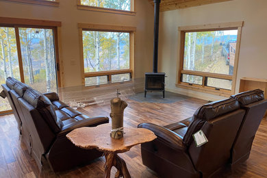 Living room - rustic living room idea in Denver