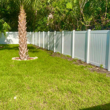 White vinyl fence