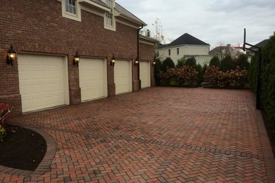 Garage - three-car garage idea in Columbus