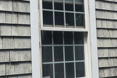 Repair rotted window sill and restored existing metal storm window.