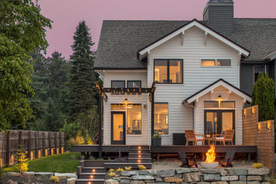 Mid-sized contemporary white two-story wood townhouse exterior idea in Seattle