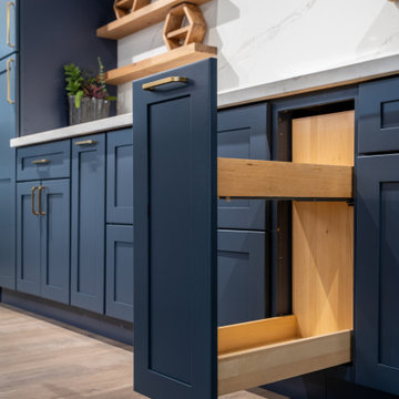 Modern Transitional Kitchen with Navy Blue Cabinets by The Cabination