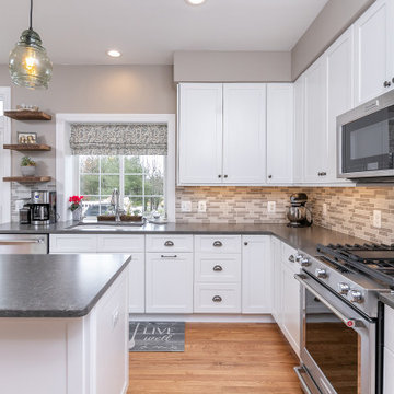 Kitchen with White Shaker Cabinetry (and WIne Rack & open shelving)
