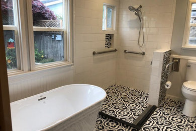 Inspiration for a mid-sized mediterranean master white tile and ceramic tile ceramic tile and multicolored floor bathroom remodel in San Francisco with a two-piece toilet and gray walls