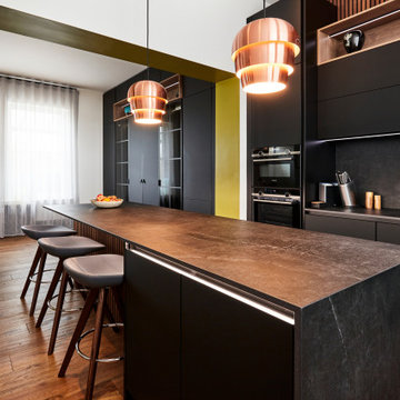 Kuhlmann Black handleless Kitchen with wooden Slat detail
