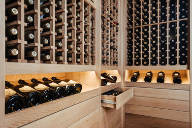 Wine cellar - contemporary wine cellar idea in Seattle