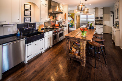 Example of a classic kitchen design in Other