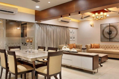 Design ideas for a contemporary living room in Kolkata.