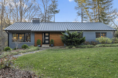 Example of an exterior home design in Other