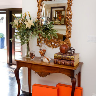 Design ideas for an expansive mediterranean open plan dining in Los Angeles with white walls, dark hardwood floors, a standard fireplace, a stone fireplace surround and brown floor.