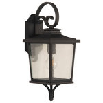 Craftmade - Tillman Small 1 Light Outdoor Lantern, Textured Matte Black - Tillman is a striking fixture designed for a variety of architectural styles.  Featuring a scroll arm and curved roof paired with the clean lines and seeded glass, the Tillman creates a welcome invitation to all your guests.