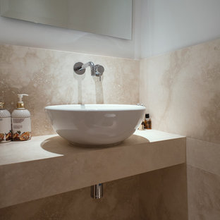 75 Beautiful Travertine Tile Powder Room With Beige Countertops