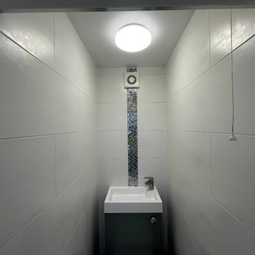 Cloakroom suit with combination toilet and sink installation in Swanley