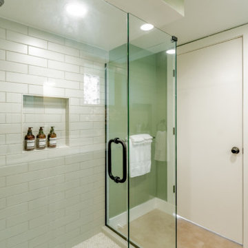 Frameless Glass Walk-In Shower and Sage Green Accents