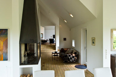 マルメにある北欧スタイルのおしゃれなファミリールームの写真