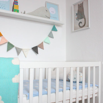 Babyzimmer in Hellblau mit Pastell