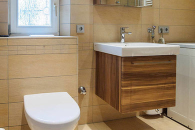 This is an example of a medium sized contemporary shower room bathroom in Frankfurt with flat-panel cabinets, a two-piece toilet, brown cabinets, a built-in shower, stone tiles, beige walls, porcelain flooring, a console sink and a shower curtain.