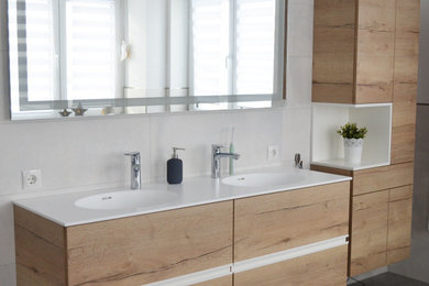 Medium sized contemporary bathroom in Other with a corner bath, a built-in shower, grey tiles, ceramic tiles, a submerged sink, an open shower, white worktops, double sinks and a floating vanity unit.