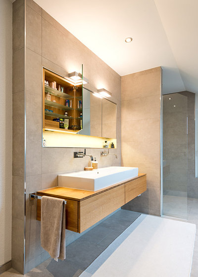 Modern Badezimmer by a-mano Möbel und bulthaup Küchen