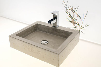 Imagen de cuarto de baño contemporáneo pequeño con encimera de cemento y lavabo sobreencimera