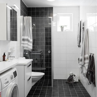 75+ Badezimmer mit schwarzem Boden und Wäscheaufbewahrung Ideen