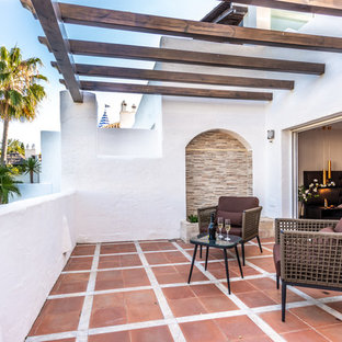 Foto de balcones mediterráneo con pérgola