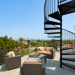 Example of a trendy metal railing balcony design in Los Angeles with no cover