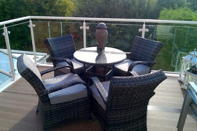 This is an example of a contemporary balcony in Devon with no cover.