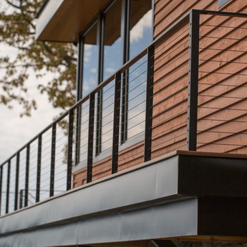 Balcony Railing with Black Cables and Fittings