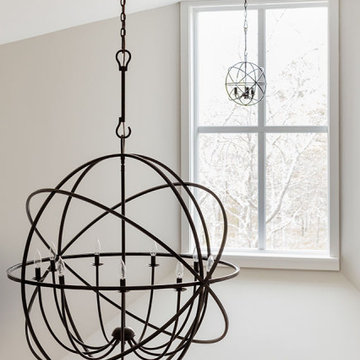 Iron Orb Pendant Light in Entryway - Boston Magazine Design Home