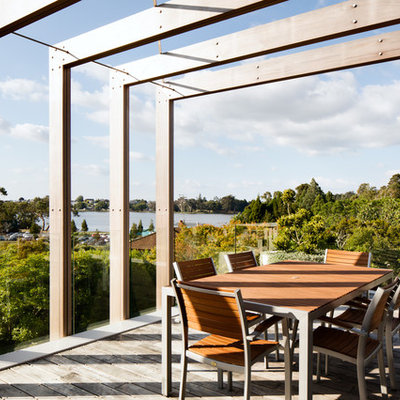 Trendy balcony photo in Hamilton with a pergola