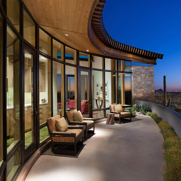 Patio with a view and contemporary lounge chairs