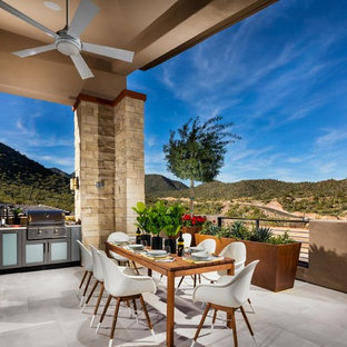 Ispirazione per un balcone stile americano di medie dimensioni con un tetto a sbalzo, un giardino in vaso e parapetto in cavi